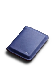 Discover the epitome of style and innovation with the Apex Slim Sleeve Wallet in Indigo. Meticulously crafted from premium materials, this wallet features a sleek, stitch-free profile and a secure magnetic closure for effortless organization. Experience the perfect blend of form and function that this ultra-slim, durable wallet offers.