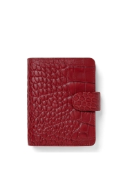 Having things in order never looked so good. The exceptional Classic Croc pocket-size diary made of premium soft calf leather with crocodile texture in maroon will do it for you. 