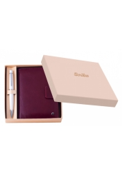 Experience the elegance of the Chic White Gift Set Ballpoint Pen by Scrikss, a Turkish luxury writing instrument specialist since 1963. This deluxe set, elegantly packaged, includes a sleek ballpoint pen with a twist mechanism and a luxurious leather notebook with lined pages, address book, and pockets for business and credit cards. Perfect for gifting, it's an exquisite blend of functionality and style, designed to satisfy your writing desires.