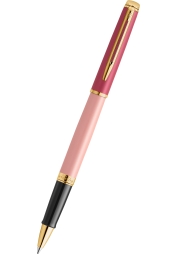 Experience the perfect blend of elegance and functionality with the Hémisphère Colour Blocking GT Roller in vibrant pink. This sophisticated writing instrument boasts a lacquered brass body, 23-carat gold-plated accessories, and the versatility of using both rollerball and ballpoint refills. Its refined design and gift box make it an ideal luxury gift for any occasion.